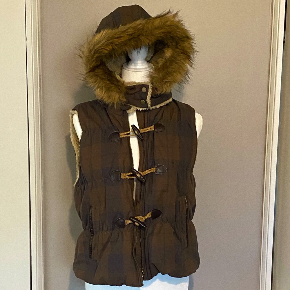 Vest with faux fur hood